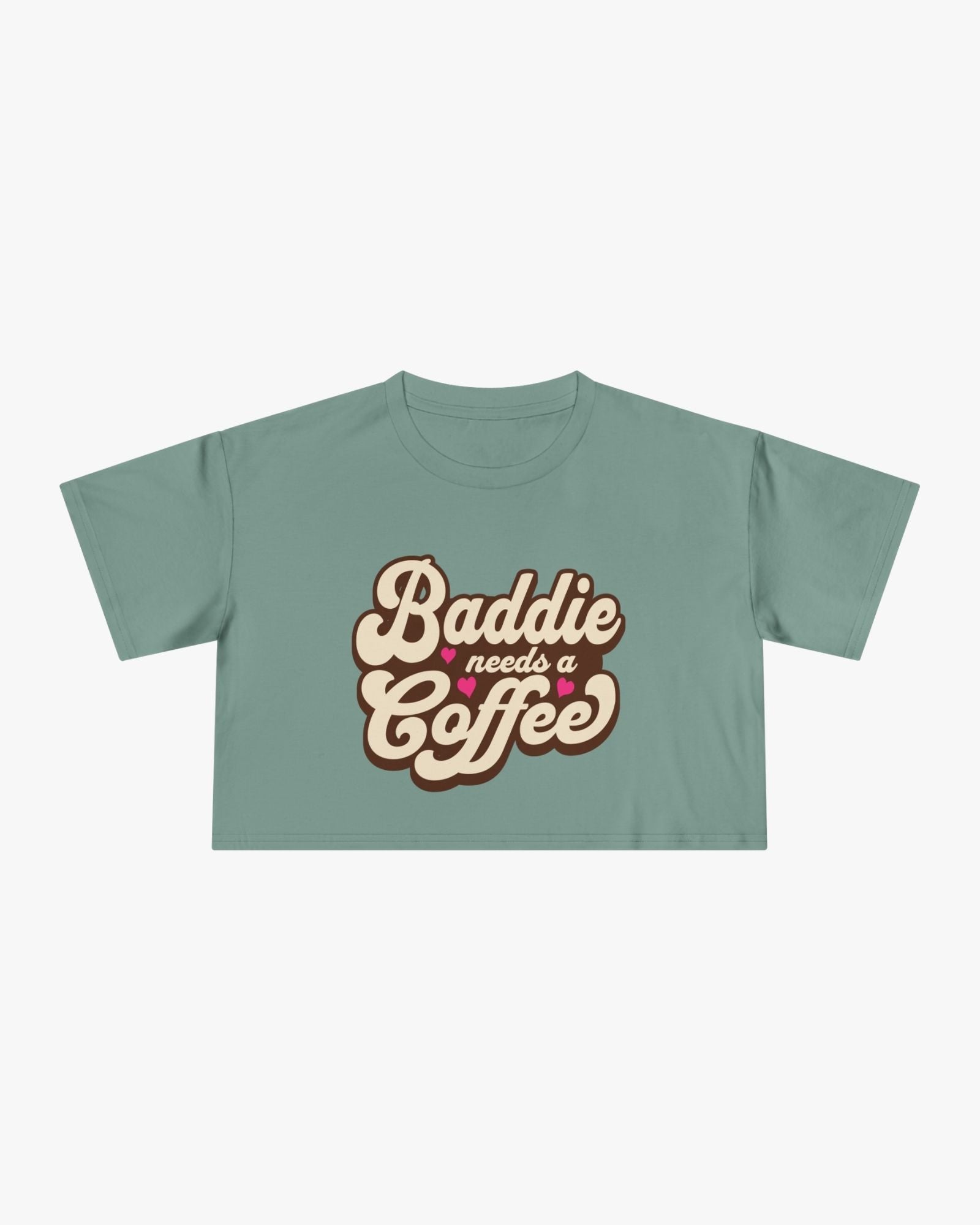 Green t-shirt with 'Baddie needs a Coffee' text on a white background