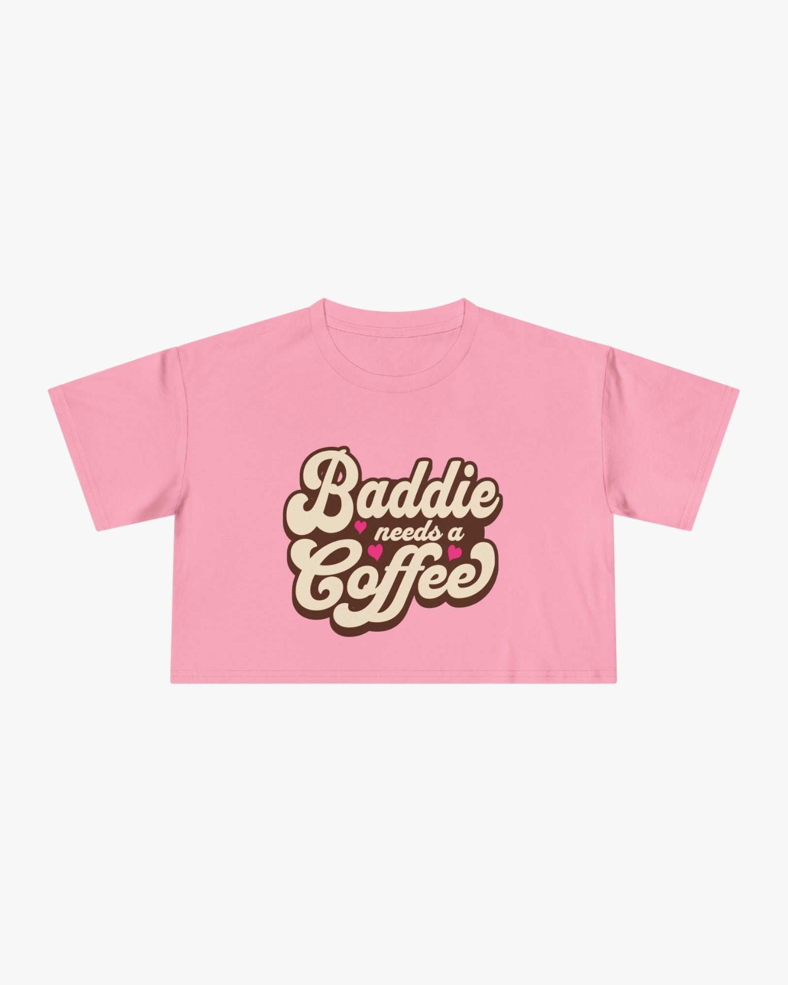 Pink t-shirt with 'Baddie needs a Coffee' text on a white background