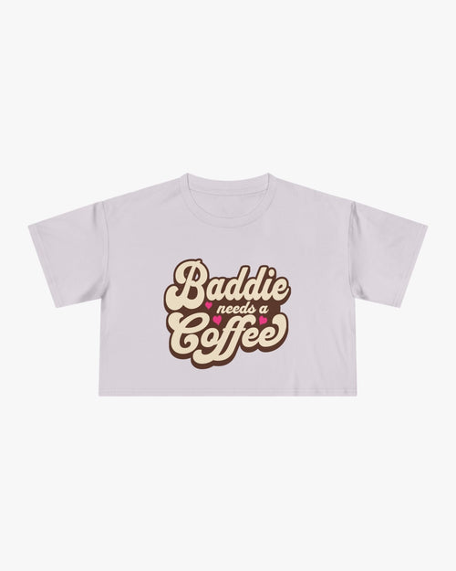 White t-shirt with 'Baddie needs a Coffee' text on a white background