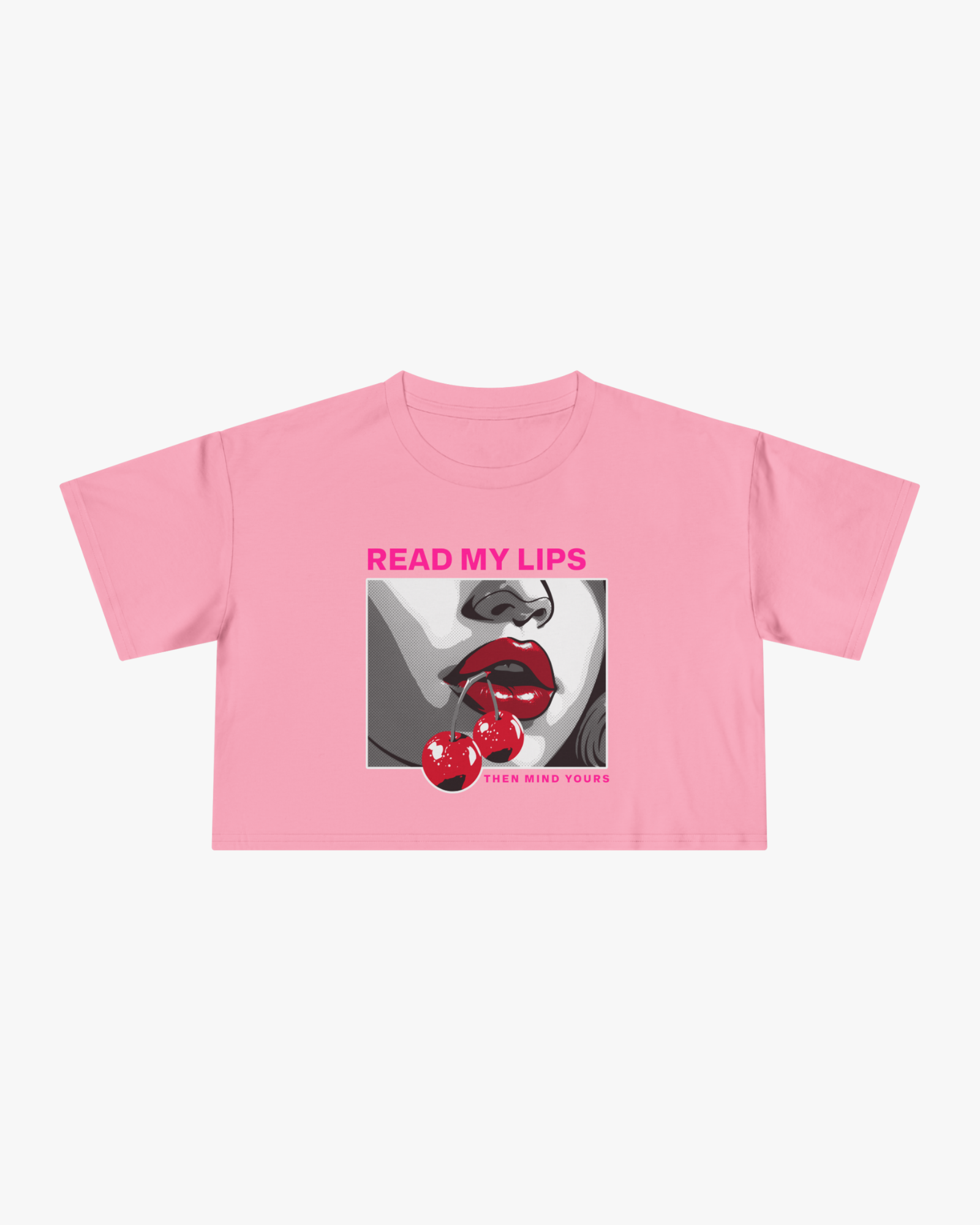 Pink t-shirt with graphic design and text 'Read My Lips' on a white background